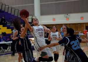 Lemoore's Taylor Chambers goes for two against Redwood in WYL action Tuesday night (Jan. 31).
